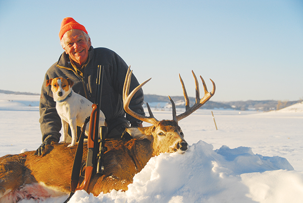 Judd Cooney with a blood trailing dog